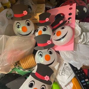Charming Snowman Ornaments with Black Hats and Pink Accents